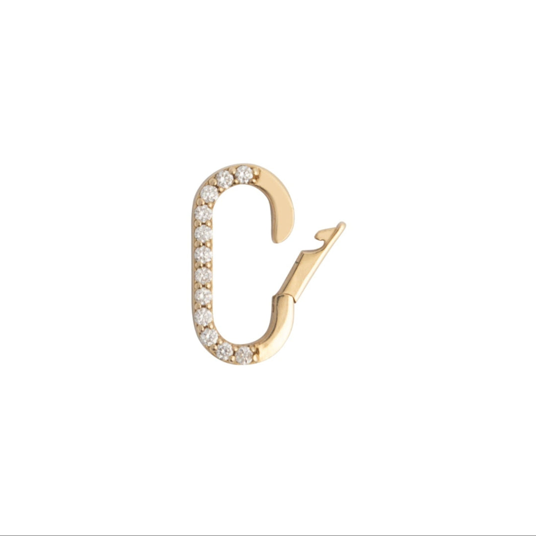 A gold pendant bail with diamonds attached to a loop, against a white background.