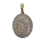 A 10k yellow and white gold round shaped pendant with pavé diamond on a white background.