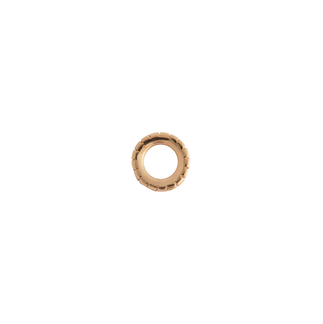Gold bead on a white background