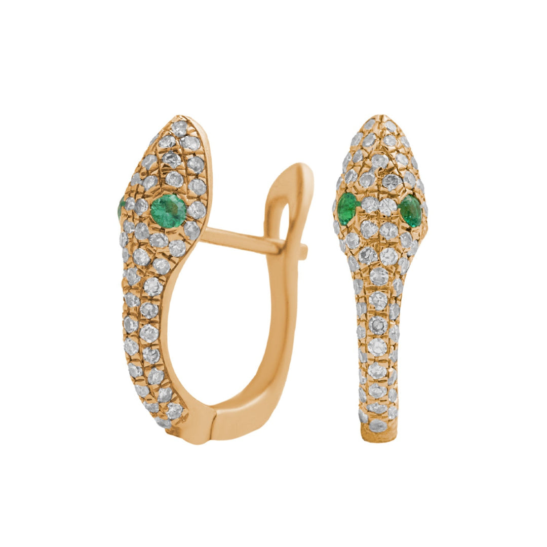 A pair of gold serpent-shaped huggie earrings adorned with natural diamonds and emeralds. 