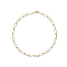A 14k gold slim link paperclip chain necklace laid out on a plain background.
