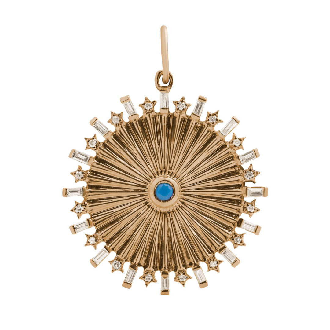 A 14k gold pendant featuring a geometric sunray pattern with a central turquoise stone and sparkling diamonds.
