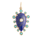 A teardrop shaped pendant with lapis and turquoise. 