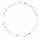 14k gold necklace with turquoise beads on a white background.