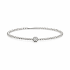 White gold bracelet with a small round gemstone on a white background