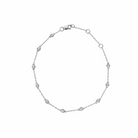 White gold bracelet with small station diamonds on a white background