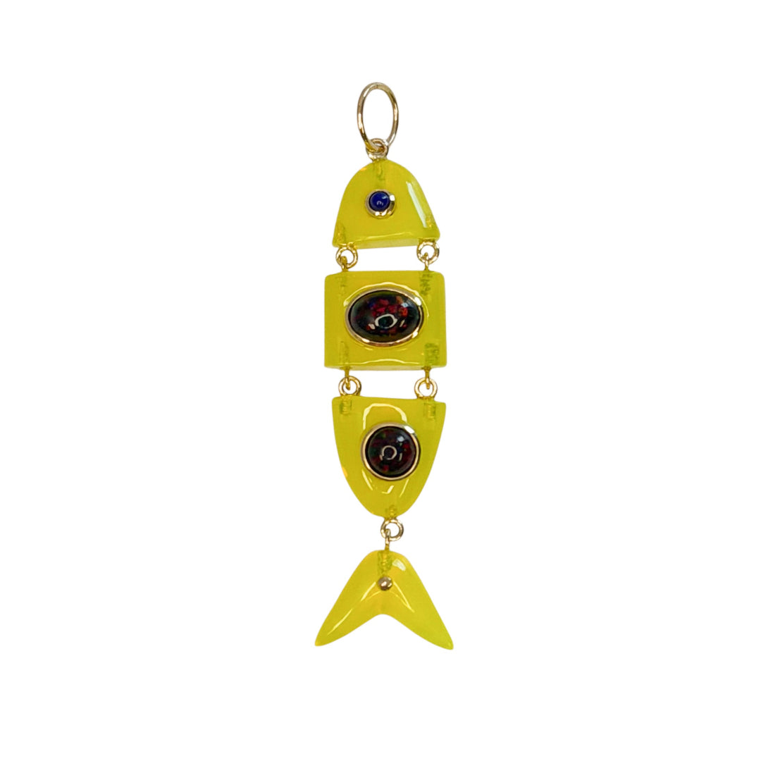 Yellow quartz deconstructed fish pendant with opal and lapis gemstones on a white background. 