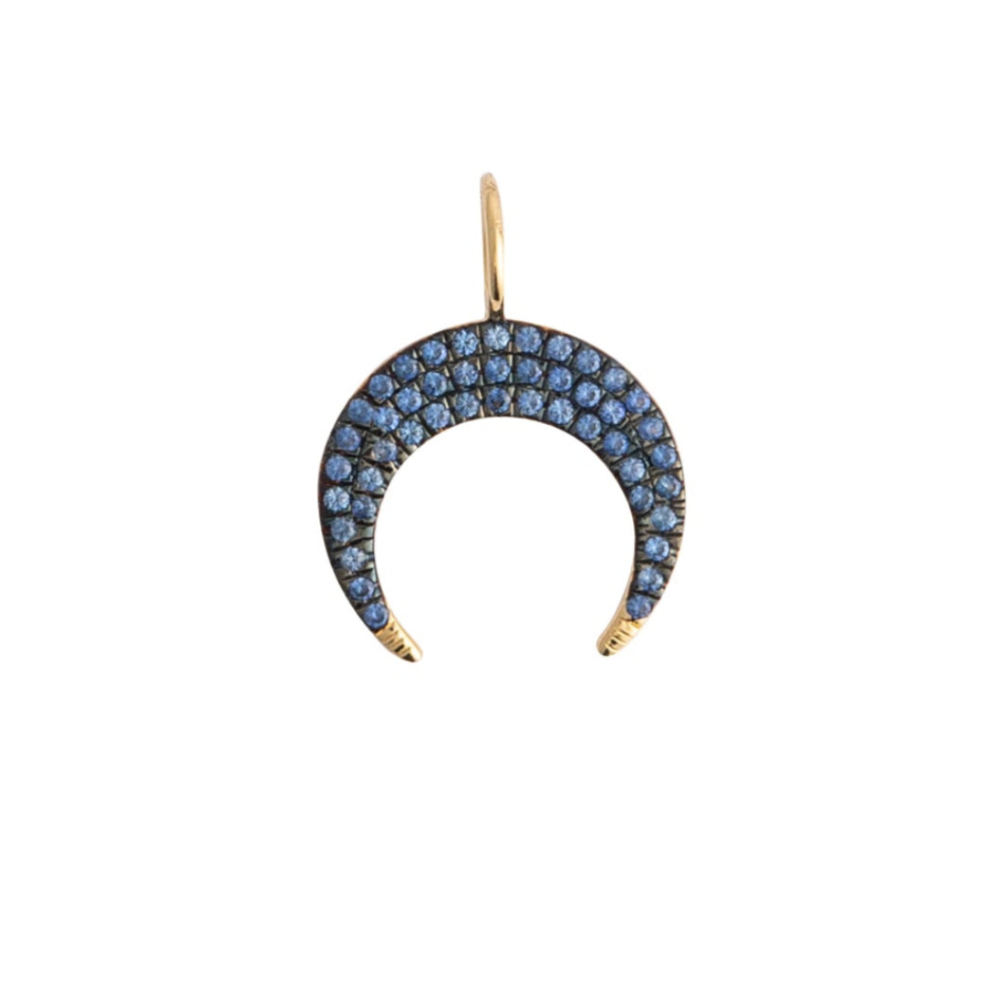 Crescent moon-shaped pendant with blue sapphires on a white background