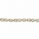 A close-up of a yellow gold tennis bracelet featuring a continuous row of round, emerald-cut, and marquise-cut diamonds on a plain white background.