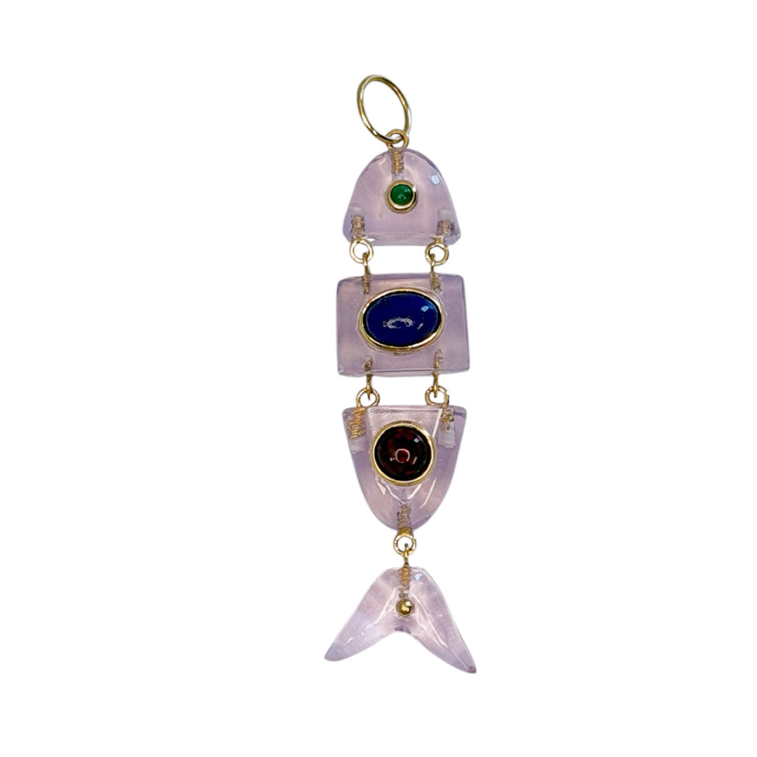 Rose quartz deconstructed fish pendant with opal and lapis gemstones on a white background. 