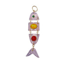 Rose quartz deconstructed fish pendant with opal and other gemstones on a white background. 