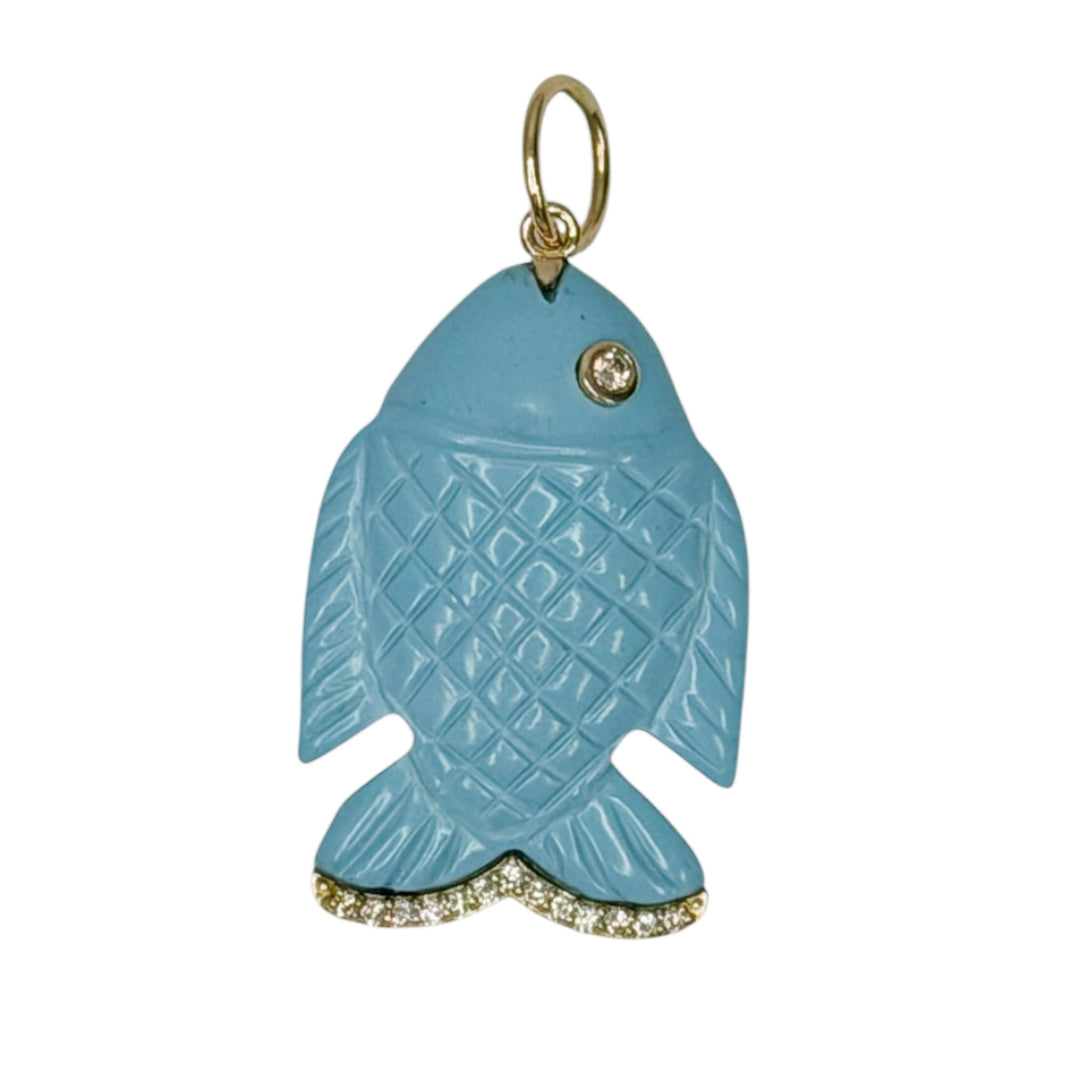 A turquoise fish-shaped pendant with diamond accents set in 14k gold on a white background.